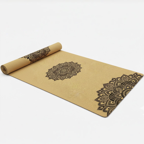 An unrolled cork yoga mat with a simple geometric line pattern.