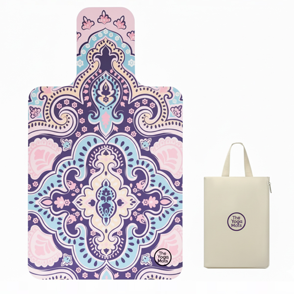 A Pilates reformer mat with an intricate purple and blue mandala pattern, shown next to its custom tote bag.