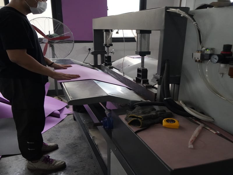 Heat-fusion lamination of dual-layer eco-friendly yoga mats.