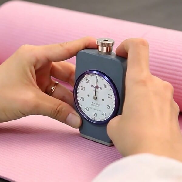 Manual thickness measurement and quality control for yoga mats